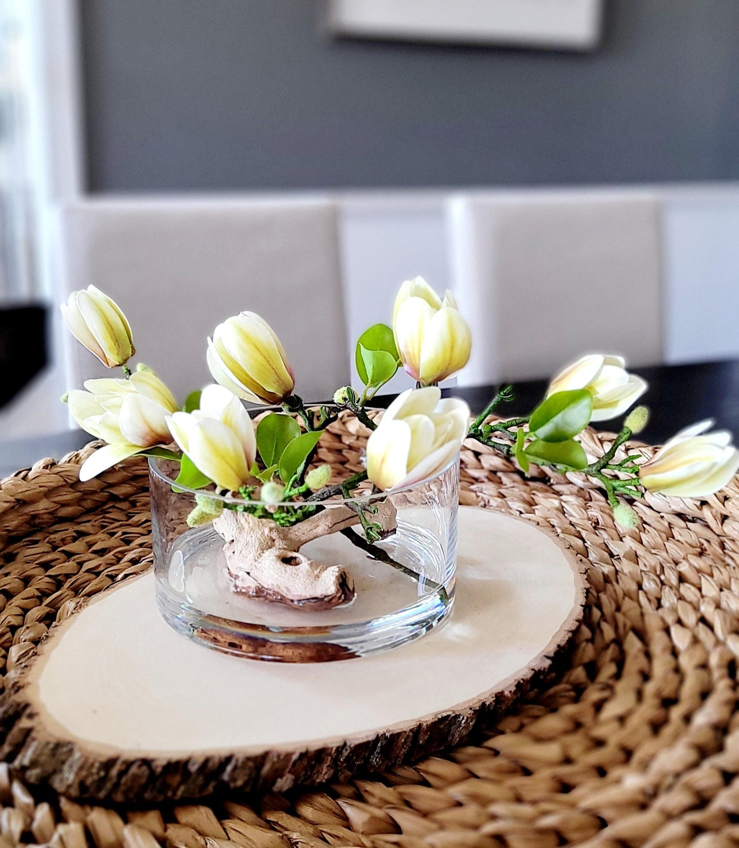Artificial Orchid Arrangement Silk Flower Centerpiece Glass Vase Display Dining Table Focal Point Modern Home Styling Elegant Faux Orchid Driftwood Accent Realistic Silk Flowers Maintenance Free Centerpiece Contemporary Living Room Display