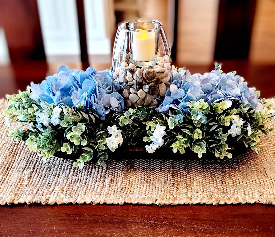 Black Dough Bowl Centerpiece Blue Hydrangea Arrangement Rustic Table Display Farmhouse Home Decor Wooden Bowl Design Nineteen Inch Size Natural Rock Elements Glass Vase Feature Votive Candle Accent Country Style Decoration Modern Farmhouse