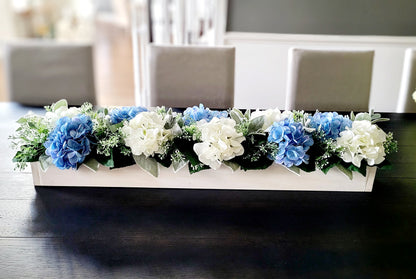 Blue Hydrangea Centerpiece Long Wood Box Arrangement Farmhouse Table Display Cream Flowers Light Blue Blooms Rustic Dining Room Styling White Wash Finish Custom Wooden Box Lambs Ear Greenery Accents Perfect Kitchen Table Centerpiece Elegant