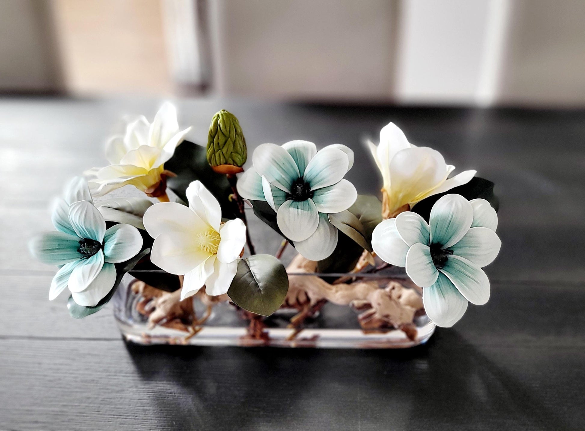 Modern Floral Centerpiece Blue Magnolia Display Long Glass Vase Arrangement Artificial Flower Collection Elegant Dining Table Decor Contemporary Home Accent Realistic Faux Blooms Maintenance Free Design Stylish Interior Addition Premium