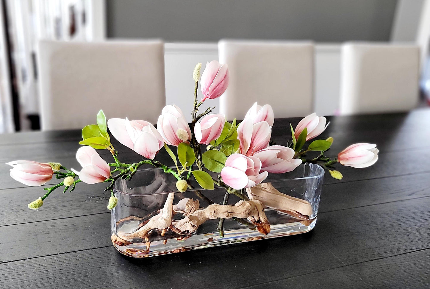 Modern Floral Arrangement Faux Orchid Display Elegant Glass Vase Centerpiece Realistic Silk Flowers Contemporary Home Decor Sophisticated Table Accent Artificial Greenery Collection Driftwood Elements Premium Quality Construction