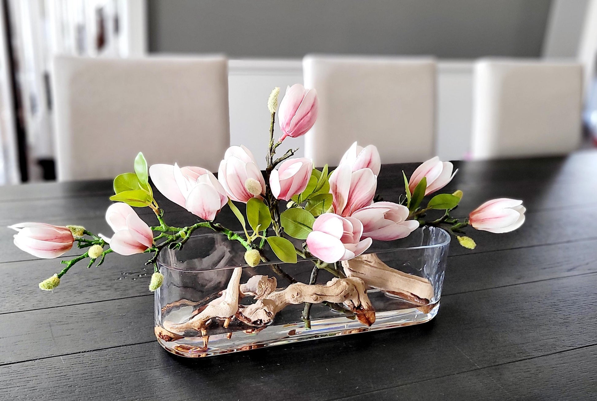 Modern Floral Arrangement Faux Orchid Display Elegant Glass Vase Centerpiece Realistic Silk Flowers Contemporary Home Decor Sophisticated Table Accent Artificial Greenery Collection Driftwood Elements Premium Quality Construction