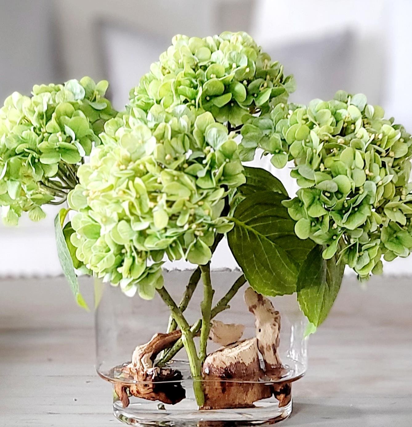 Permanent Floral Display Silk Hydrangea Arrangement Glass Vase Centerpiece French Country Farmhouse Style Realistic Faux Flower Design Maintenance Free Dining Table Accent Living Room Styling Real Feel Texture Quality Resin Water Driftwood
