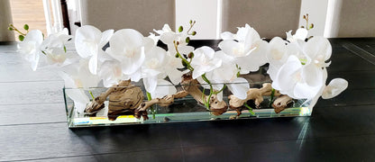 Maintenance Free Orchid Arrangement Silk Flowers Elegant Centerpiece Glass Vase Design Driftwood Natural Accents Dining Table Decoration No Watering Required Permanent Floral Display Realistic Looking Blooms Home Decor Accent Sophisticated