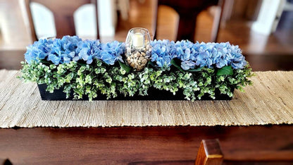 Blue Hydrangea Arrangement Wooden Box Centerpiece Farmhouse Style Decor Rustic Table Decoration Floral Display Piece Handcrafted Wood Container Natural Finish Design Lush Green Accents Beautiful Dining Table Accent Country Home Style