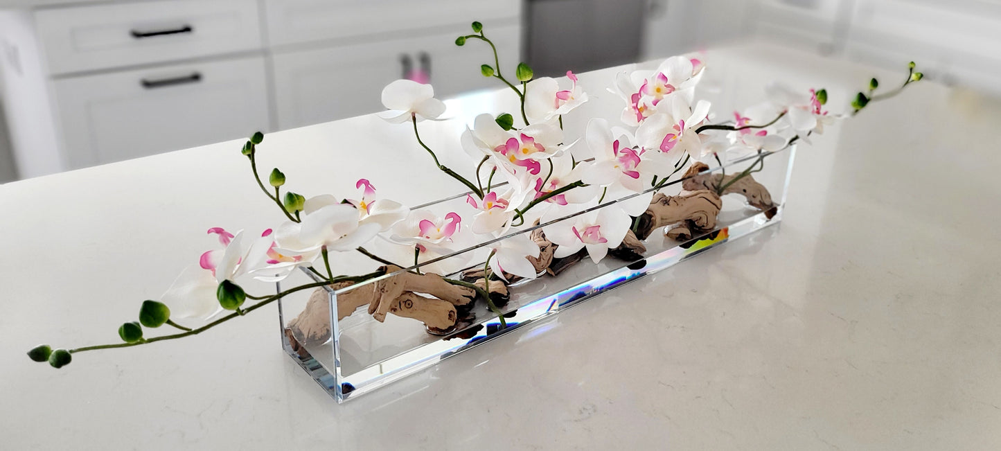 Artificial Orchid Arrangement Pink Silk Flowers Glass Vase Centerpiece Modern Home Styling Faux Orchid Display Realistic Flower Design Maintenance Free Pink White Blooms Driftwood Accent Elegant Table Centerpiece Living Room Enhancement