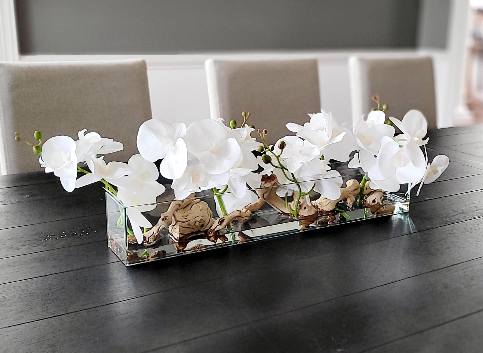 Orchid Centerpiece Silk Flower Arrangement Dining Table Decor Elegant Glass Vase Driftwood Accents Maintenance Free Display Realistic Floral Design Home Decoration Piece Sophisticated Interior Accent Always In Bloom Artificial Orchids Faux