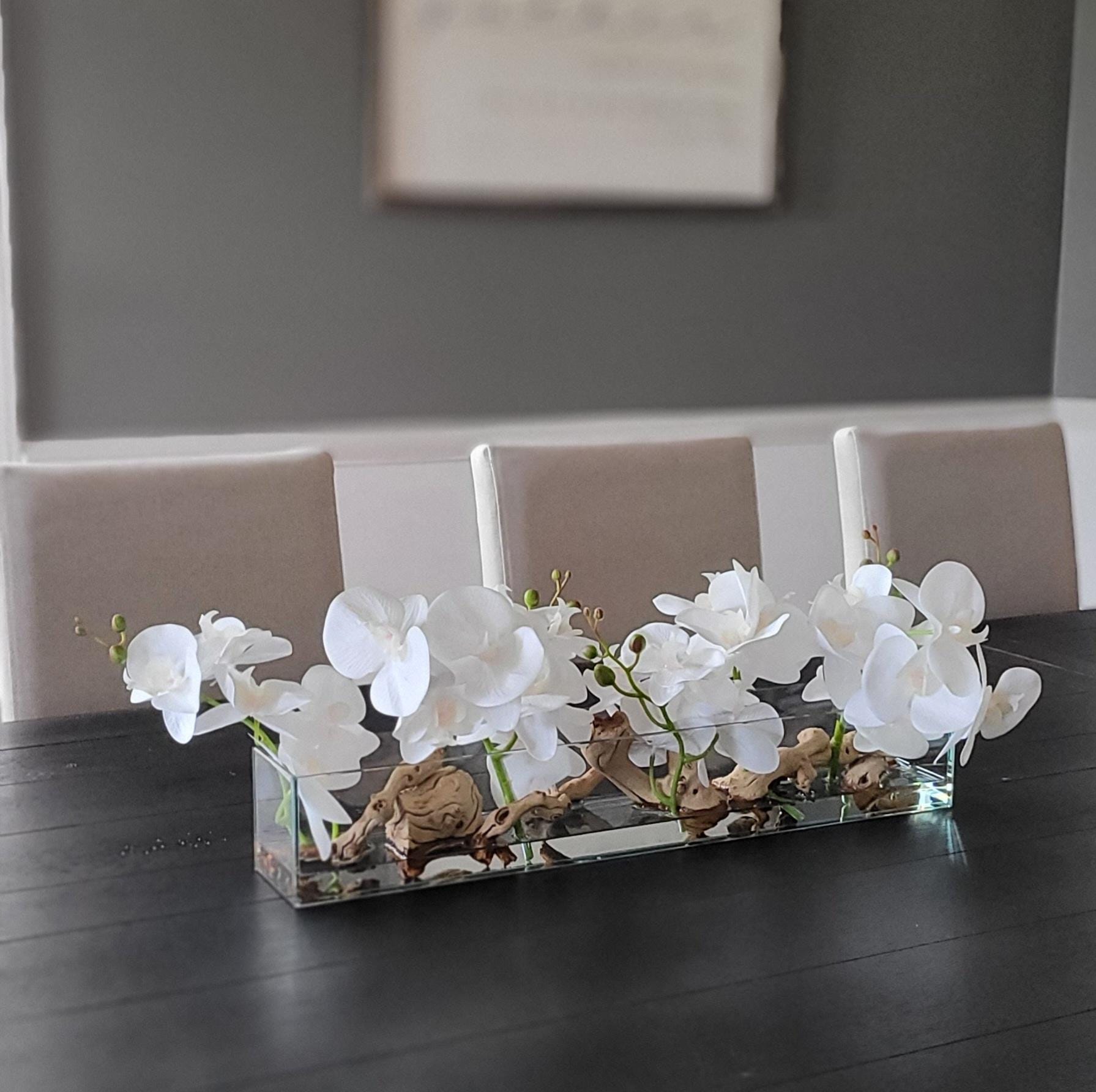 Elegant Glass Vase Orchid Arrangement Silk Flowers Driftwood Accents Maintenance Free Centerpiece Realistic Floral Design Dining Table Decoration Home Decor Accent Sophisticated Interior Style Artificial Orchids Faux Water Display Natural