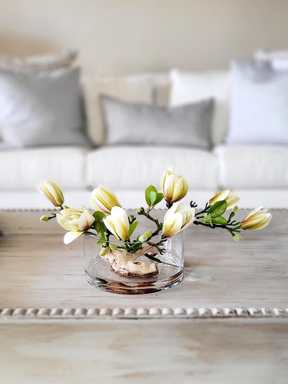 Realistic Faux Orchid Display Silk Flower Arrangement Glass Vase Centerpiece Elegant Dining Table Styling Modern Artificial Orchid Collection Driftwood Accent Details Maintenance Free Home Display Contemporary Living Room Focal Point