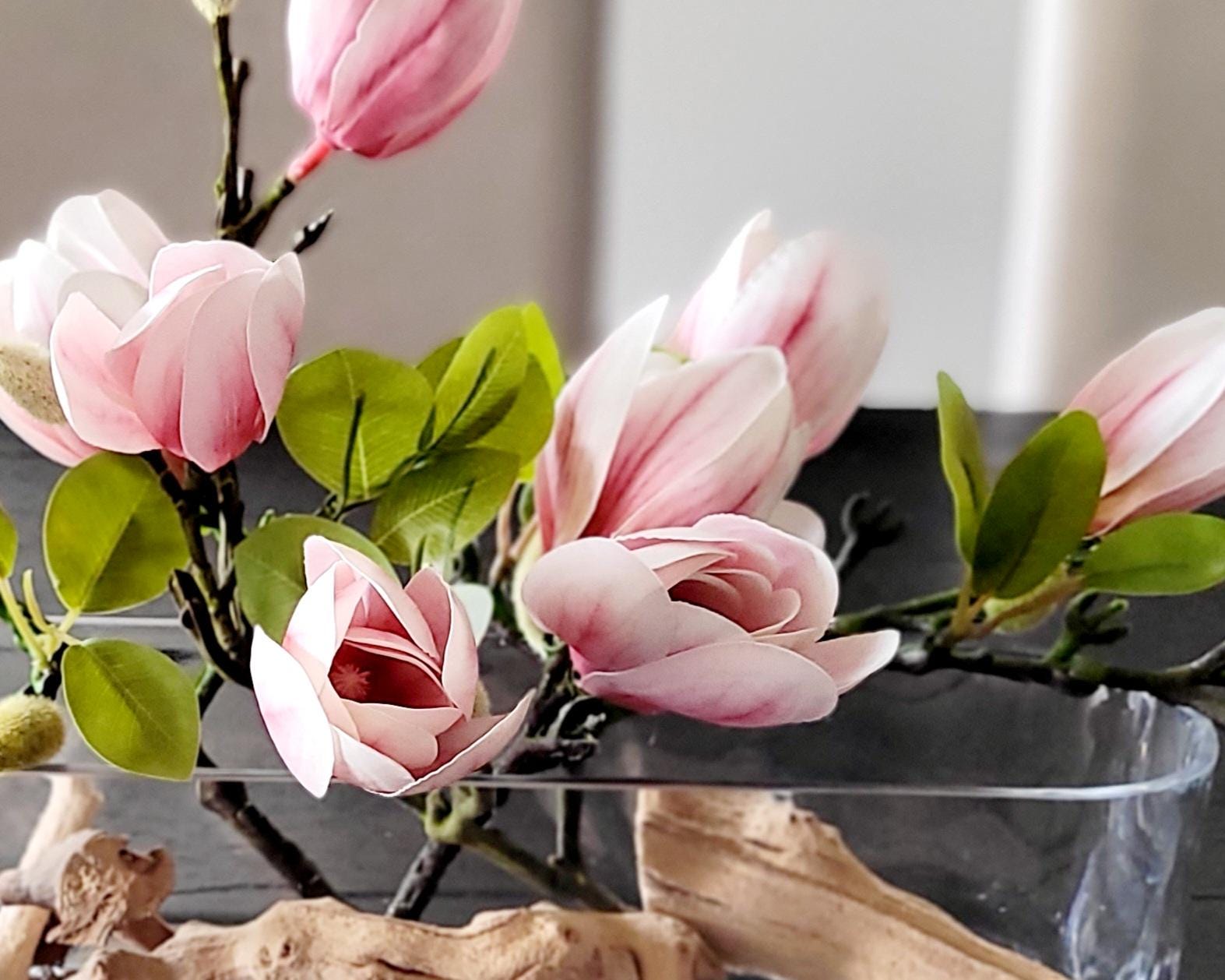 Realistic Silk Orchid Arrangement Elegant Glass Vase Display Modern Floral Centerpiece Faux Water Illusion Sophisticated Table Decor Artificial Flower Collection Botanical Home Accent Premium Quality Construction Driftwood Elements