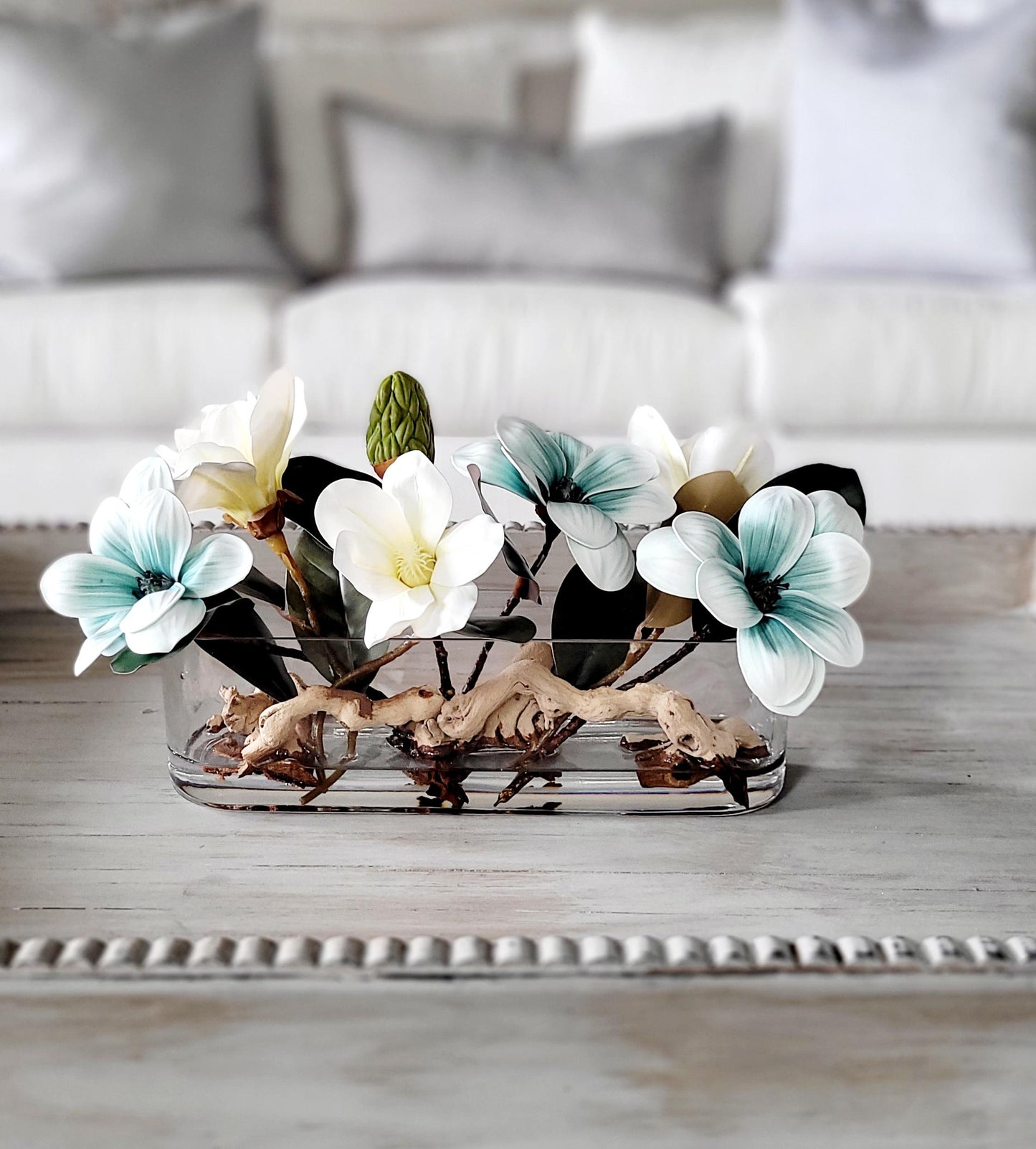 Dining Table Centerpiece – Blue Magnolia Arrangement in Long Glass Vase