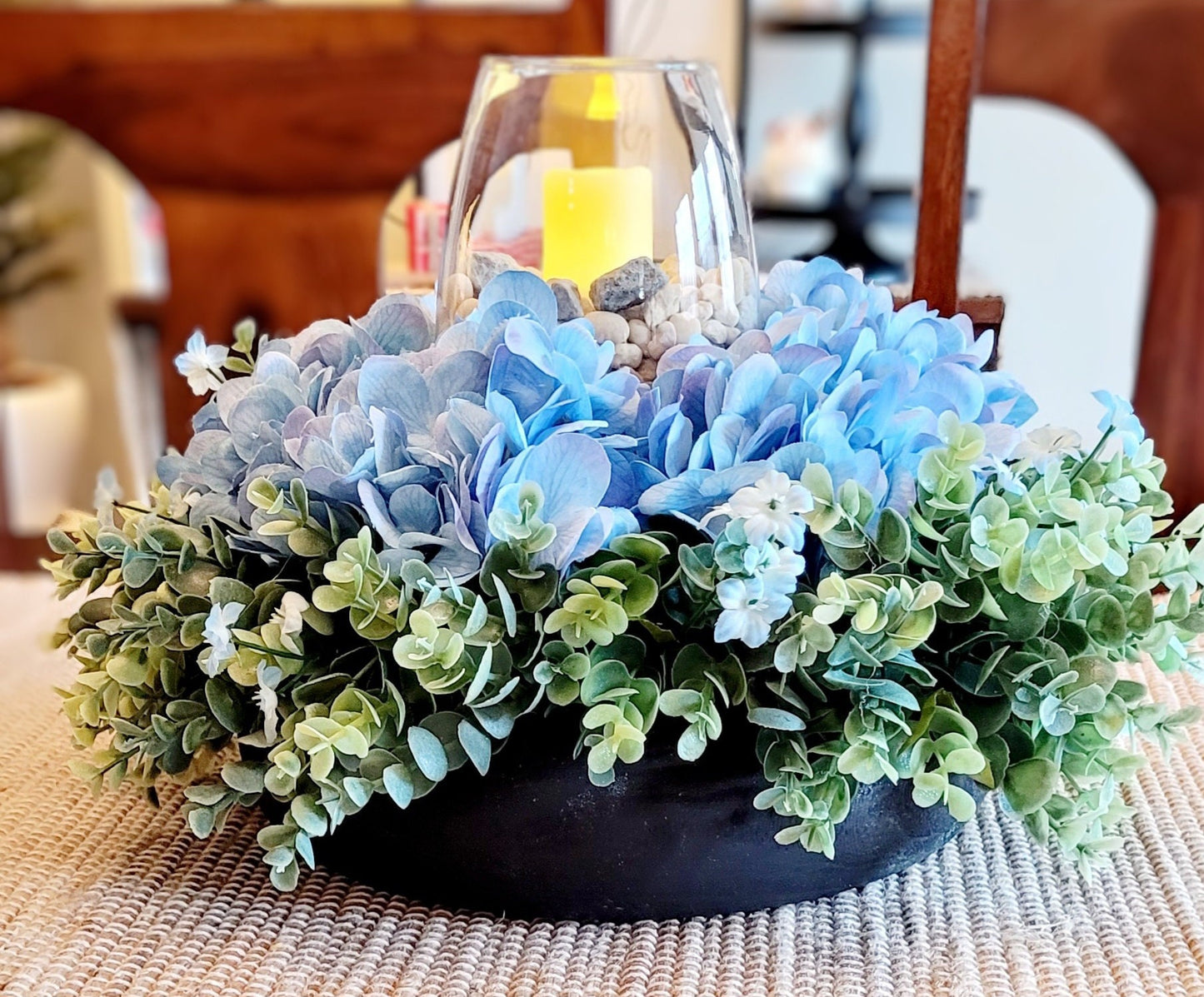 Rustic Table Centerpiece – Black Dough Bowl with Blue Hydrangeas and Candle