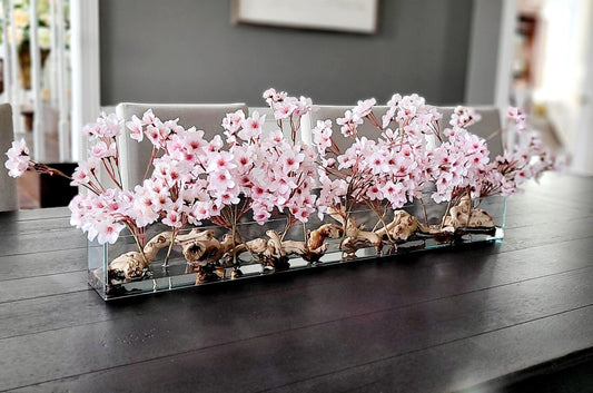 Modern Dining Table Centerpiece Silk Peony Arrangement Glass Vase Display Artificial Flower Collection Contemporary Home Decor Elegant Table Setting Perfect Dining Room Accent Realistic Floral Design Faux Cherry Blossoms Driftwood Details