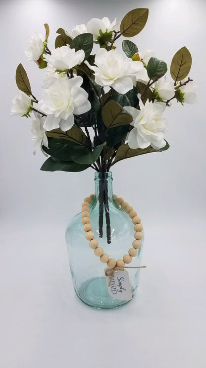 Farmhouse Wine Jug Centerpiece with White Magnolia