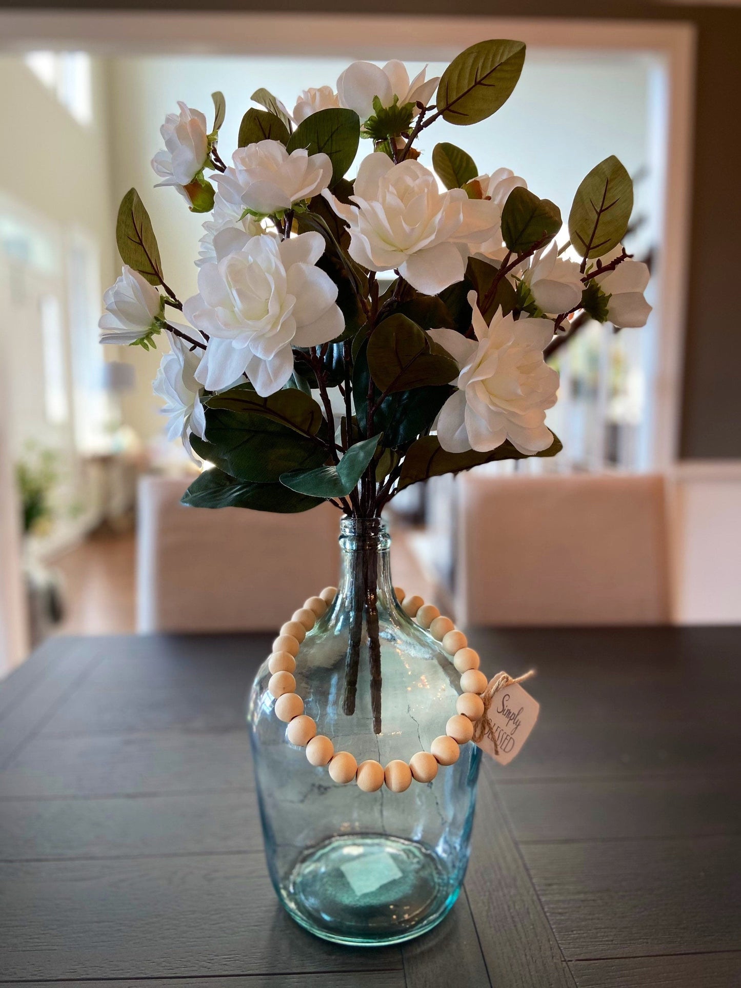 Farmhouse Wine Jug Centerpiece with White Magnolia