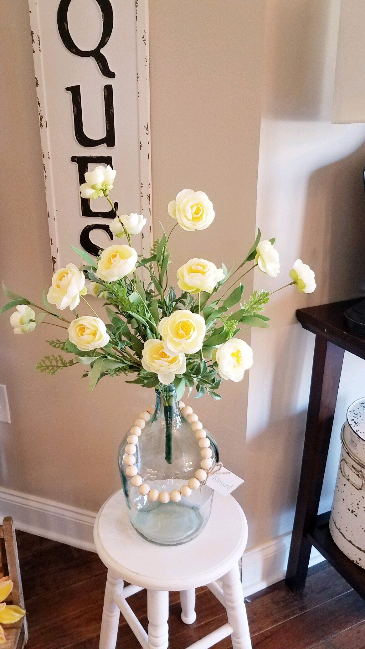 Farmhouse Wine Jug Centerpiece with Yellow Floral and Wood Beads