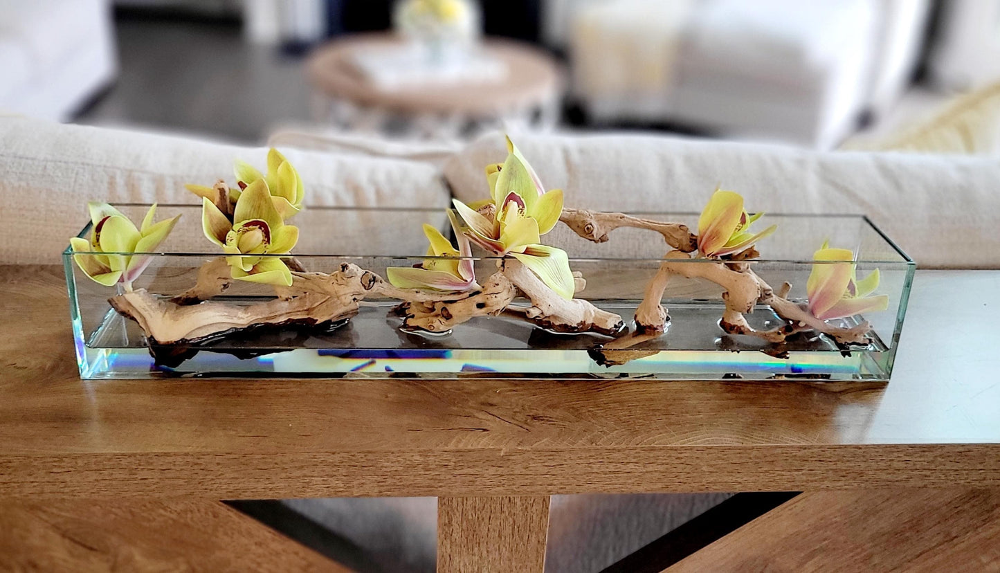 Glass Vase Centerpiece Artificial Orchid Arrangement Modern Table Styling Silk Flower Display Yellow Green Blooms Driftwood Accent Pieces Natural Stone Collection Rectangular Container Design Dining Room Coffee Table Console Entryway