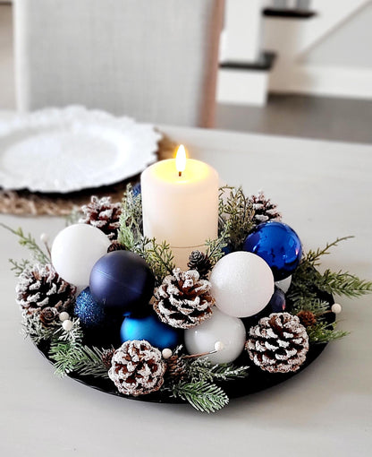 Rustic Christmas Centerpiece Winter Table Candle Arrangement Handcrafted Farmhouse Holiday Display Festive Pine Greenery Natural Pinecones Red Ornament Collection Seasonal Dining Focal Point Traditional Styling Modern Appeal Warm Inviting