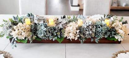 Dining Table Centerpiece Long Wood Box With Hydrangea Flowers Cream White Blue Gray Blooms Three Pillar Candles Rustic Farmhouse Style Arrangement Artificial Botanical Display Eucalyptus Lambs Ear Greenery Handcrafted Quality Design Perfect