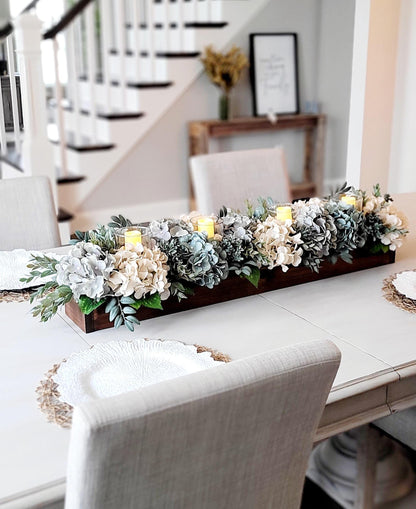 Long Rectangular Centerpiece Wooden Box Filled With Artificial Flowers Hydrangea Blooms In White Cream Blue Tones Three Candles Integrated Design Eucalyptus Lambs Ear Greenery Rustic Home Accent Perfect Dining Room Table Display Coffee
