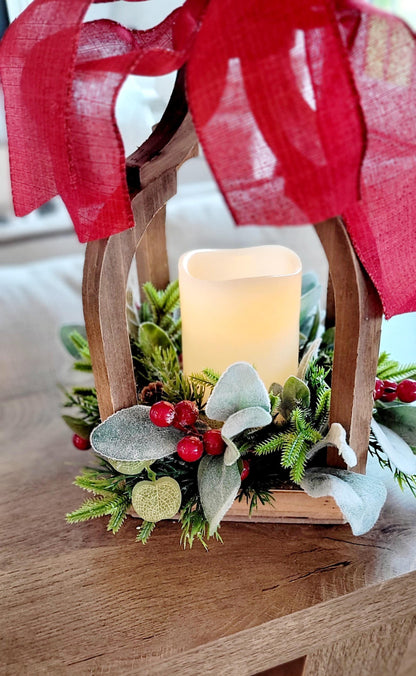 Wooden Christmas Lantern Rustic Farmhouse Centerpiece Holiday Table Display Battery Operated LED Candle Flameless Safe Lighting Red Ribbon Bow Accent Pine Berry Greenery Arrangement Winter Home Gift Seasonal Mantel Styling Dining Room Table