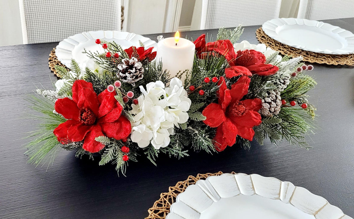 Festive Holiday Table Display Christmas Farmhouse Centerpiece Wooden Bowl Candle Arrangement Red Poinsettia White Hydrangea Evergreen Pine Branches Seasonal Berries Pinecone Accents Winter Dining Room Mantel Kitchen Island Rustic Home
