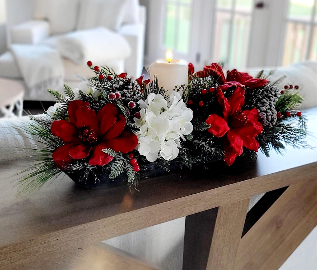 Winter Holiday Centerpiece Christmas Farmhouse Table Display Wooden Dough Bowl Candle Arrangement Red Poinsettia White Hydrangea Blooms Evergreen Pine Branches Seasonal Berries Pinecones Festive Dining Room Mantel Kitchen Island Rustic Home