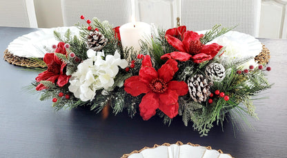 Rustic Christmas Dining Table Centerpiece Farmhouse Wooden Dough Bowl Candle Display Red Poinsettia Floral Arrangement White Blooms Evergreen Pine Branches Berry Accents Snow Dusted Pinecones Holiday Mantel Kitchen Console Seasonal Winter